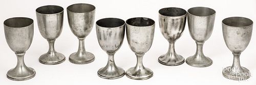 Eight pewter chalices