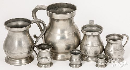 Seven pewter baluster measures, 19th c.