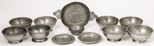 Eight pewter bowls, a porringer and dishes