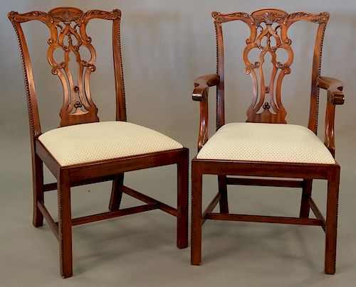 Maitland Smith set of eight Chippendale style dining chairs, two arm and six side with clean upholstered seats.
