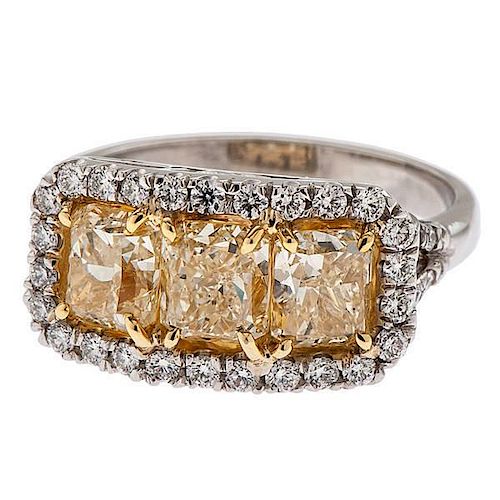 E.G.L. U.S.A. Certified Fancy Intense Yellow Platinum Three-Stone Ring with White Diamond Accents 