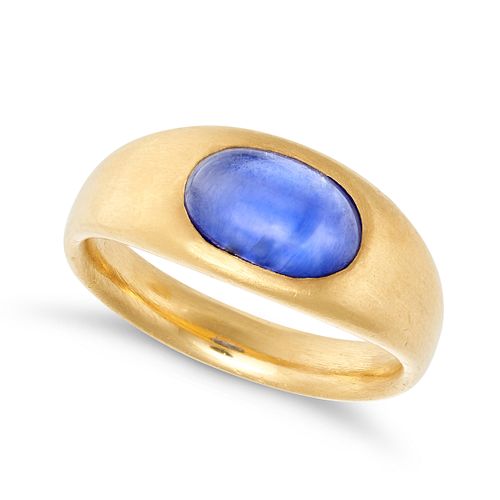A 4.16 CARAT UNHEATED KASHMIR SAPPHIRE GYSPY RING in high carat yellow gold, set with a cabochon ...