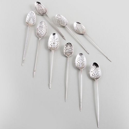 Group of Eight English Silver Mote Spoons