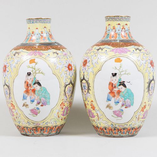 Pair of Chinese Famille Rose Yellow Ground Vases