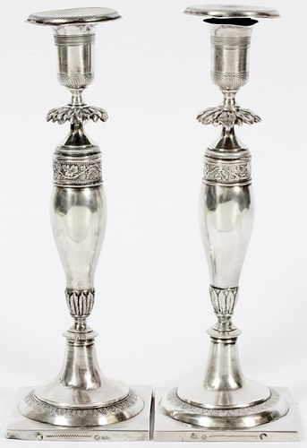 PAIR OF WEIGHTED SILVER CANDLESTICKS POSSIBLY HANAU