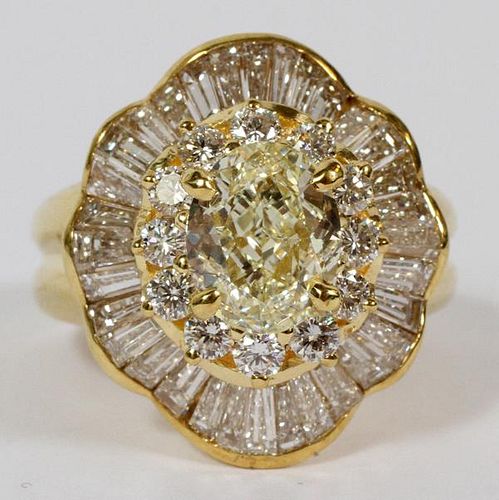 NATURAL YELLOW DIAMOND AND 18KT YELLOW GOLD RING