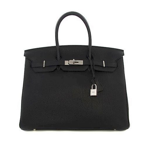 An Hermes 35cm Noir Veau Togo Leather Birkin Bag, 14 x 7 x 10 inches.