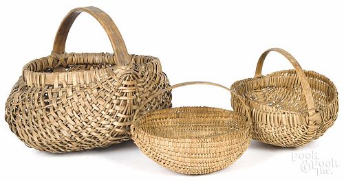 Buttocks basket, 14 1/2'' h., 16'' w., together with two smaller baskets.