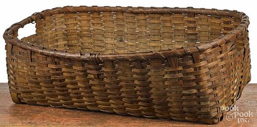 Large split oak basket, 19th c., 9'' h., 30 1/2'' w.
