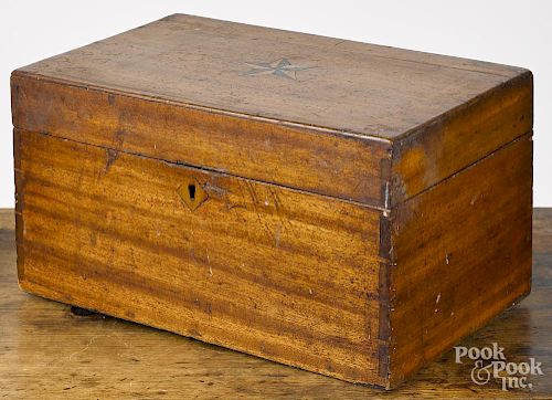 Mahogany lock box, 19th c., with a star inlaid lid, 7'' h., 13'' w.