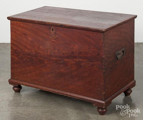 Pennsylvania painted pine blanket chest, 19th c., retaining an old red grained surface, 25'' h.