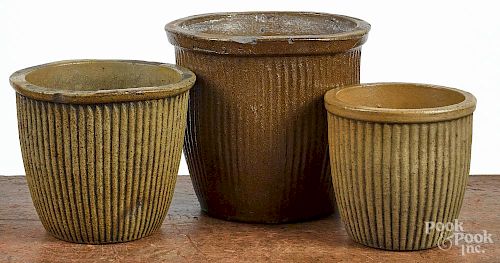 Three ribbed stoneware crocks, 19th c., attributed to J. Swank, the largest stamped Johnstown, PA