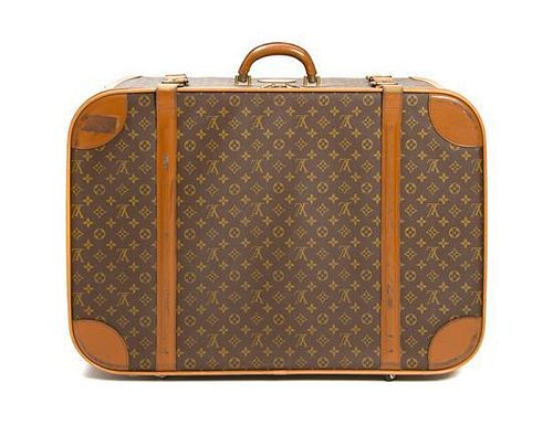 A Louis Vuitton Monogram Canvas Softsided Suitcase, 29 x 20 1/2 x 9 inches.