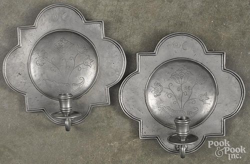 Pair of Continental engraved pewter sconces, 19th c., 9 1/2'' h., 9 1/2'' w.