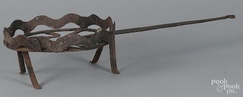 Wrought iron revolving trivet, 19th c., 22 1/2'' l.