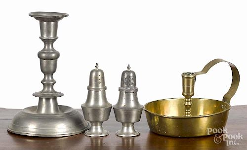 Woodbury pewter candlestick, 8 3/4'' h., together with a pair of shakers and a brass chamberstick.