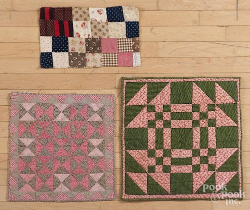 Three pieced doll quilts, ca. 1900, largest - 19'' x 19''.