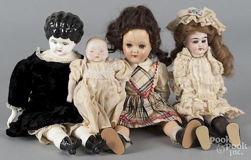 Four assorted dolls.