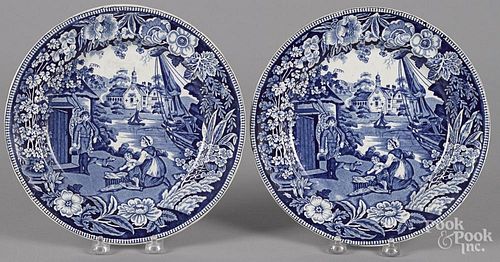 Pair of blue Staffordshire plates, 19th c., depicting a fisherman and his family, 10'' dia.