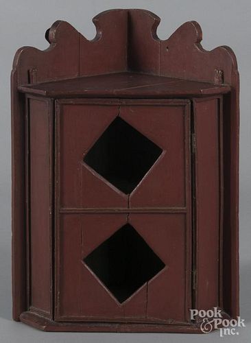 Small painted hanging corner cupboard, early 20th c., 18'' h., 13'' w.