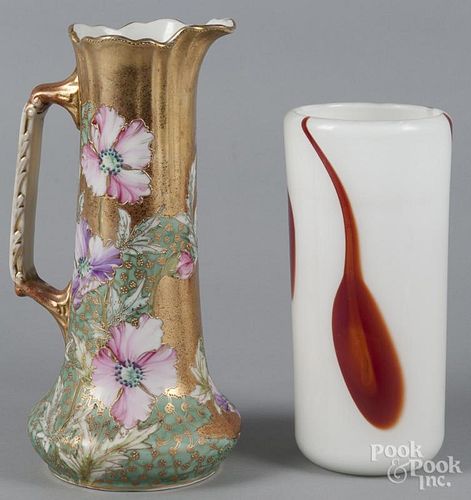 Royal Nippon porcelain pitcher, 13 1/2'' h., together with an art glass vase, 10 1/2'' h.