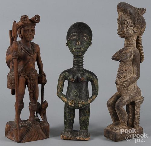 Three ethnographic carved wood figures, tallest - 20''.
