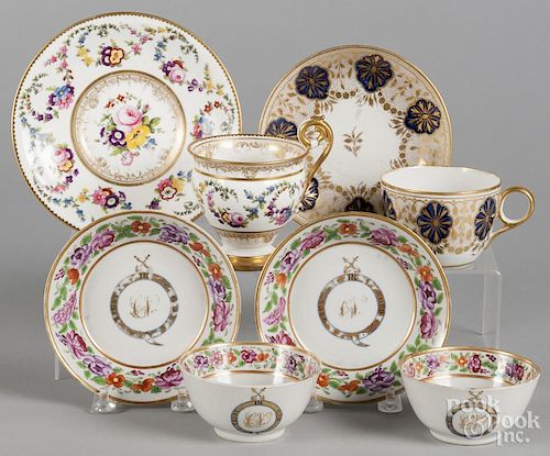 Four assorted porcelain cups and saucers, 19th c., to include a pair inscribed Trust in God.