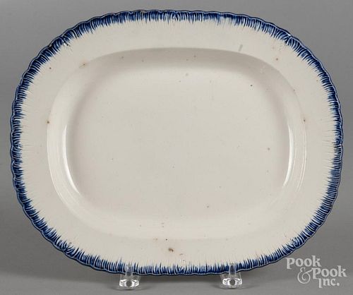 Pearlware blue feather edge platter, 19th c., impressed Adams, 11'' l., 13 1/2'' w.