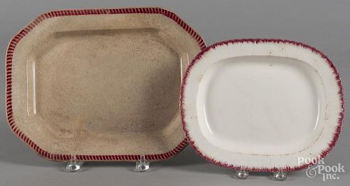 Two pearlware red feather edge platters, 19th c., 9 1/2'' l., 12 1/2'' w. and 8'' l., 9 3/4'' w.
