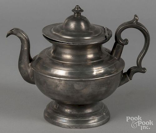 Cincinnati, Ohio pewter teapot, 19th c., bearing the touch of Sellew & Co., 7 1/4'' h.