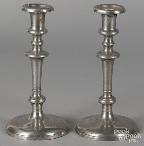 Pair of Cincinnati, Ohio pewter candlesticks, 19th c., bearing the touch of Flagg & Homan, 9'' h.
