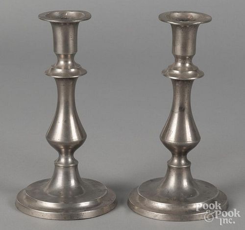 Pair of pewter candlesticks, 19th c., attributed to Homan & Co., Cincinnati, Ohio, 8'' h.