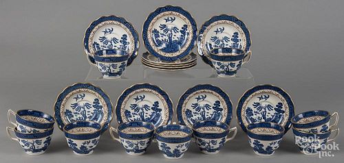 Eleven Blue Willow cups and saucers, by Booths.