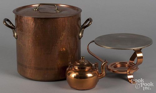Large copper pot, 12'' h., together with a warming stand and a small dovetailed kettle.