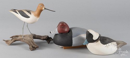 Two carved and painted duck decoys, by Don Kitchen, together with a shorebird decoy, 10 1/2'' h.
