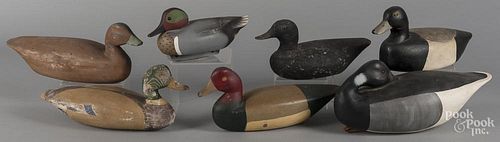 Seven assorted carved and painted duck decoys, longest - 16''.