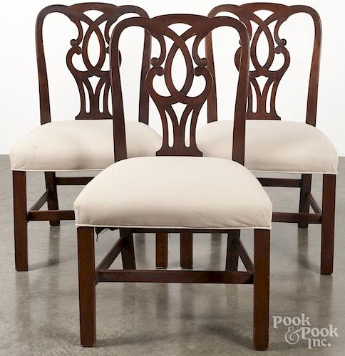 Set of four English mahogany dining chairs, probably 19th c.