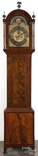 English mahogany tall case clock, early 19th c., with an eight-day movement with a brass face