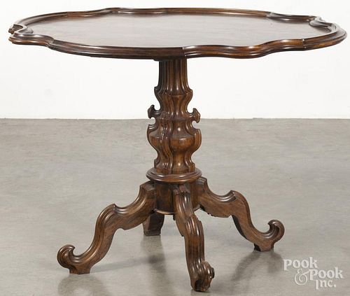 Victorian rosewood tilt top table, 28 1/2'' h., 32 1/2'' w., 38 1/2'' d.