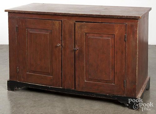 Painted pine cupboard base, 19th c., retaining an old red stain