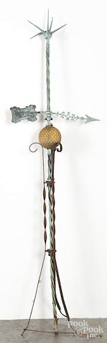 Copper lightning rod with an arrow and amber glass ball, 71'' h.