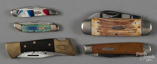 Five Case pocket knives.