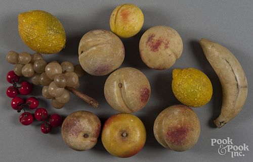 Fourteen pieces of stone fruit, to include a banana, two lemons, etc.
