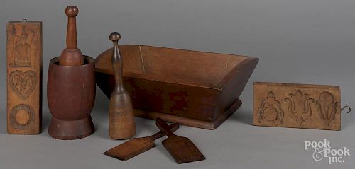 Woodenware, to include two maple food molds, a red stained mortar and pestle, etc.