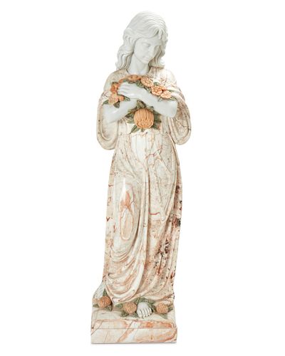 A marble and alabaster sculpture of a woman