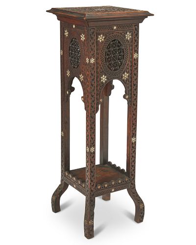 A North African carved wood stand