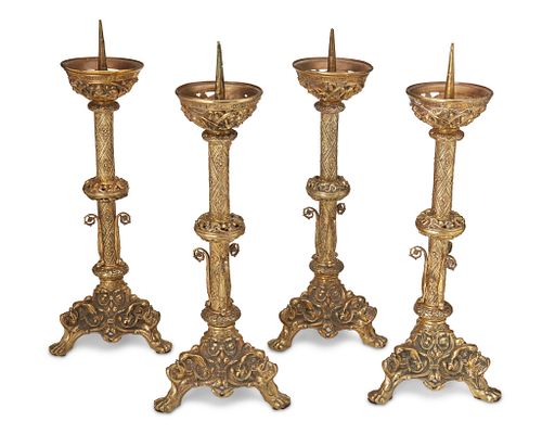 A set of bronze pricket candlesticks
