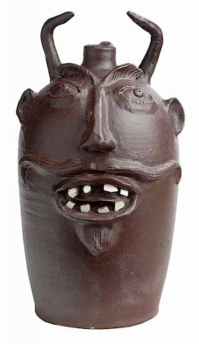 Brown Pottery Devil Jug