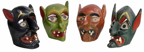 Four Colorful Painted Wood Masks