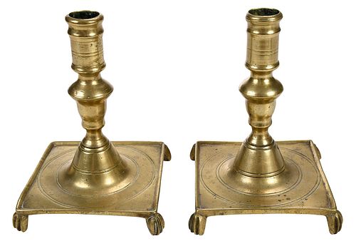 Pair of Brass Footed Continental Candlesticks